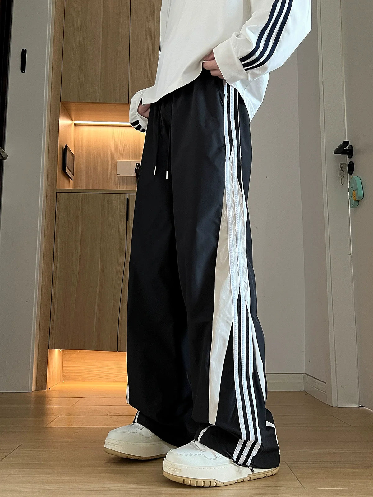 Wide-Leg Black Track Pants with White Side Stripes