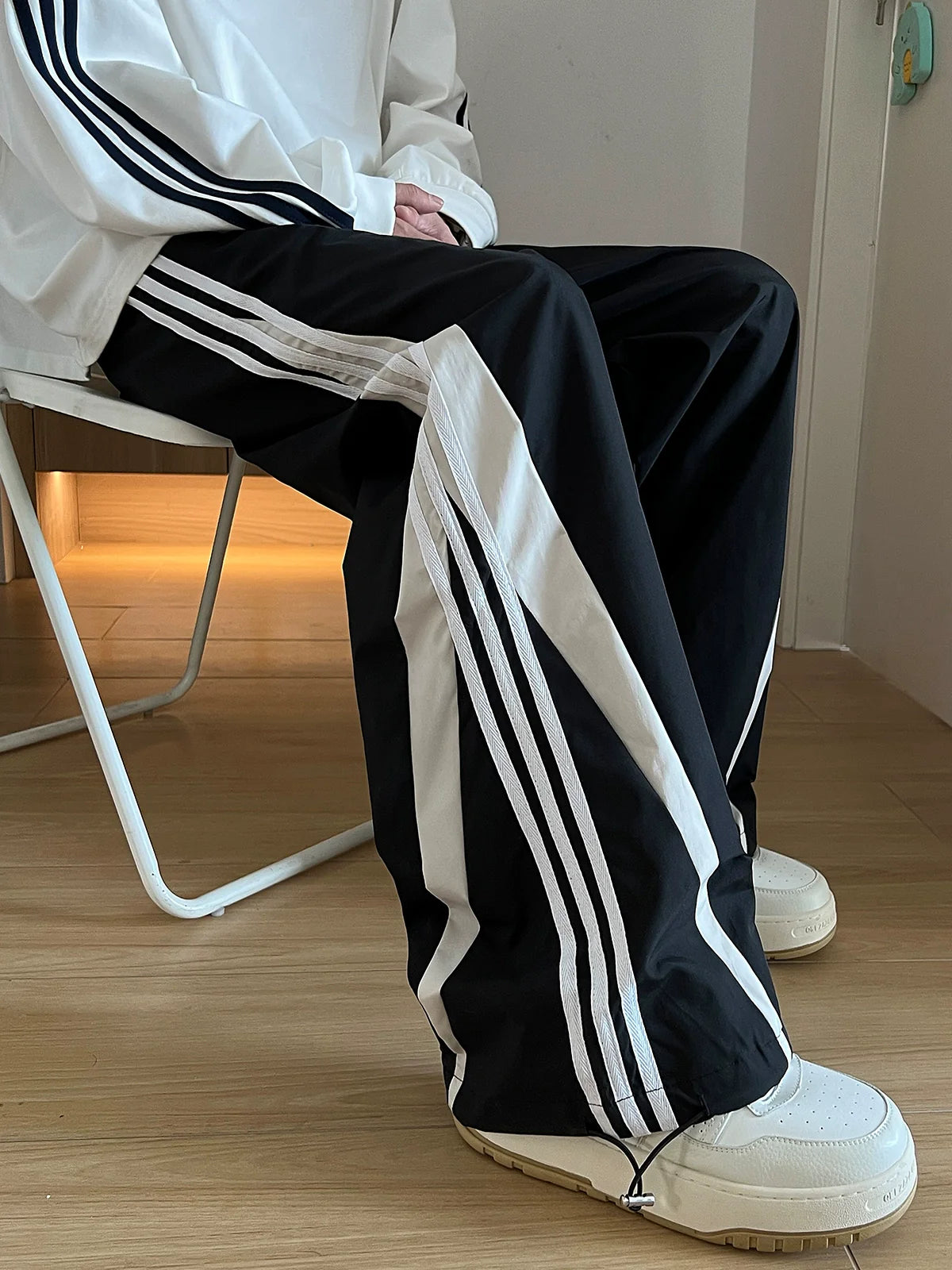 Wide-Leg Black Track Pants with White Side Stripes