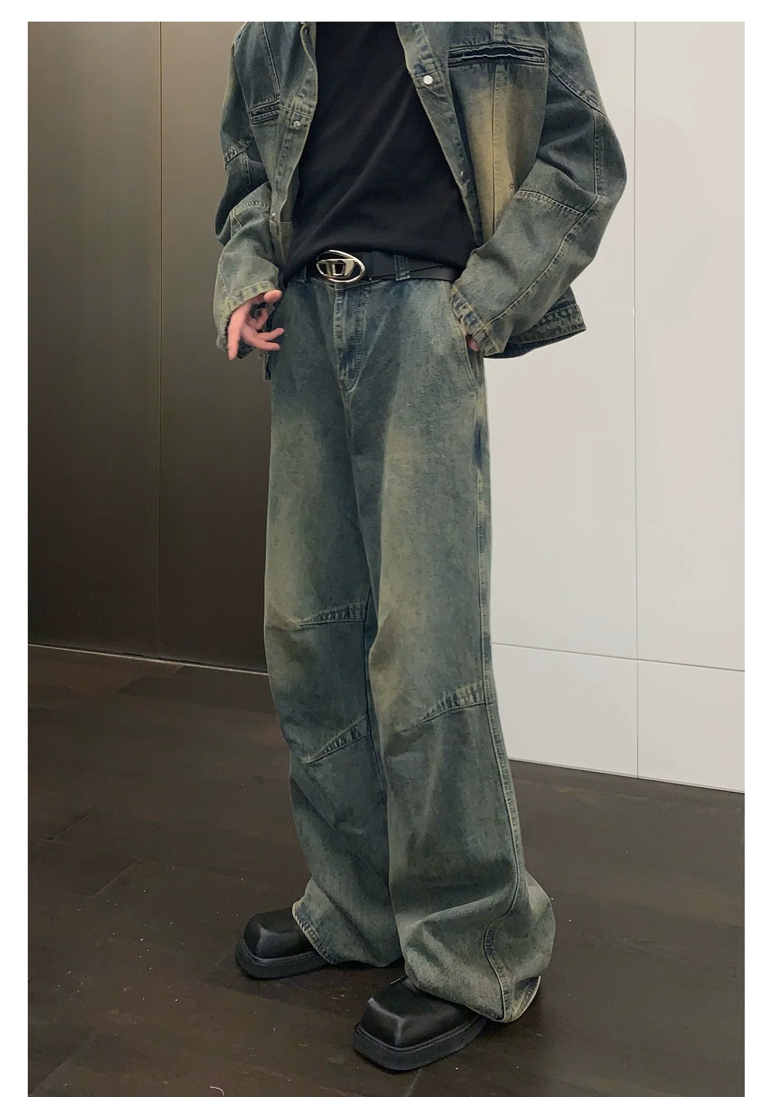 Wide-Leg Faded Distressed Jeans with Unique Seam Detailing